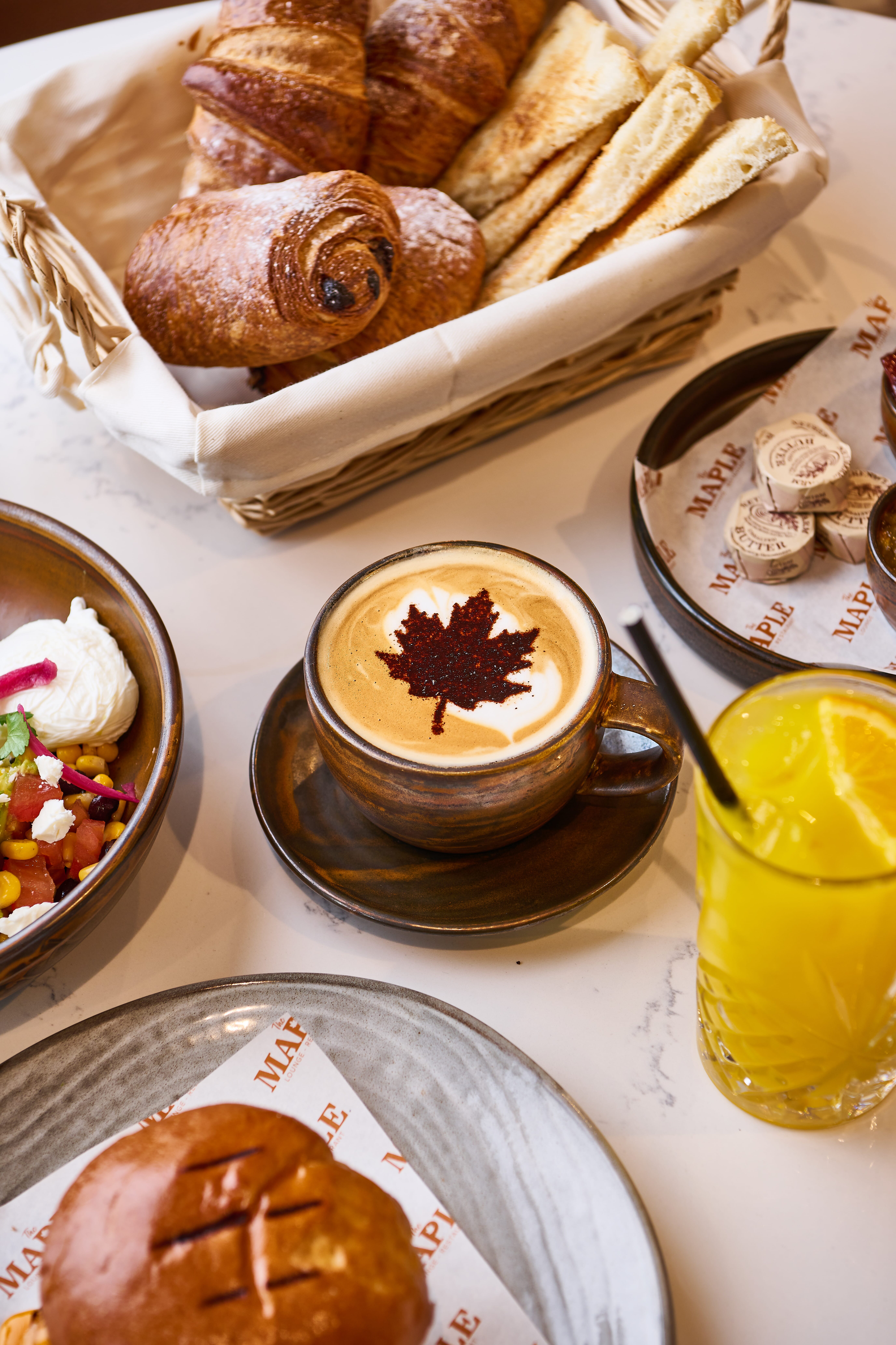 Basket of Pastries, Coffee, Orange Juice